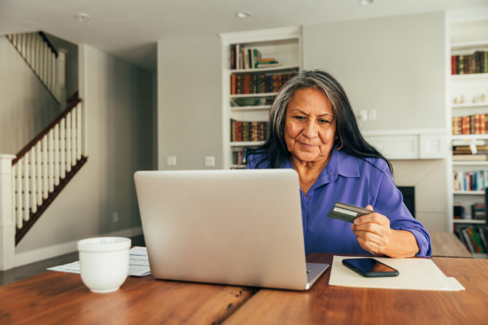 Senior Woman Paying Bills and Banking Online