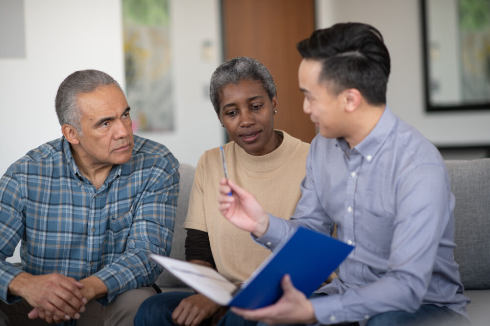 elderly couple consults a financial advisor