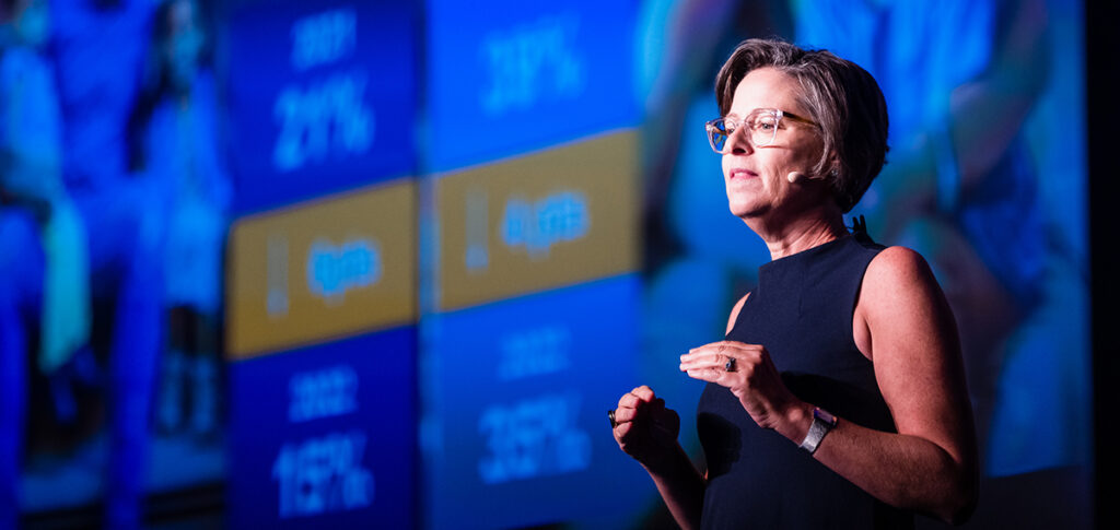 Jennifer Tescher on stage at EMERGE