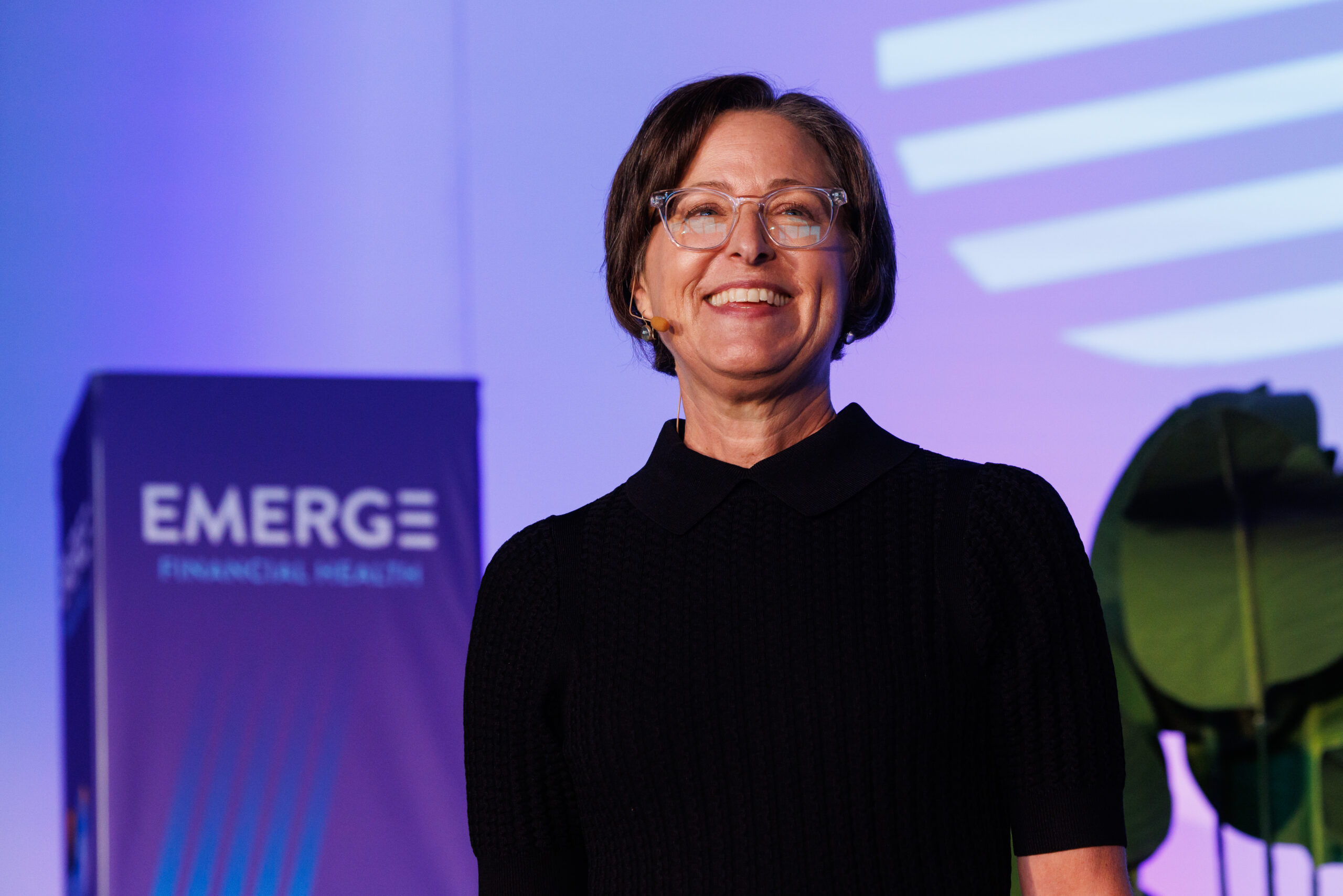 Jennifer Tescher on stage at EMERGE