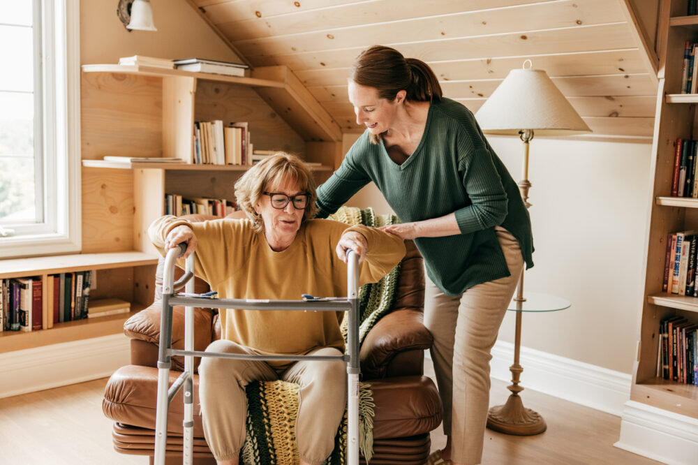 Caring for elderly. Caregiver provides support and care to family or friends