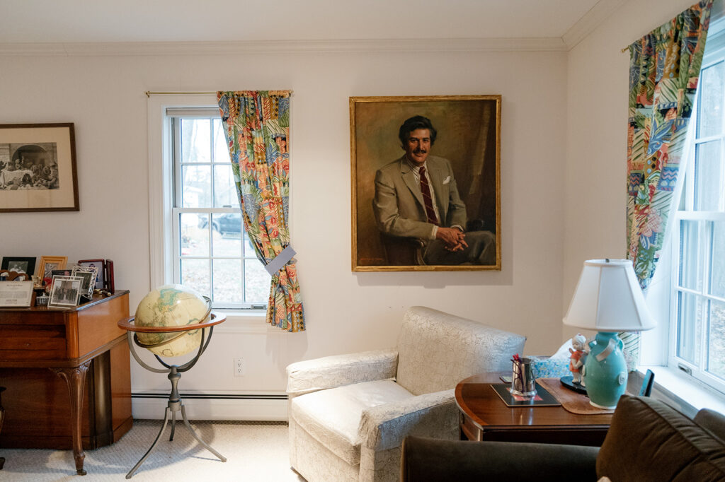 Elizabeth's living room with a large portrait of the sisters' father.