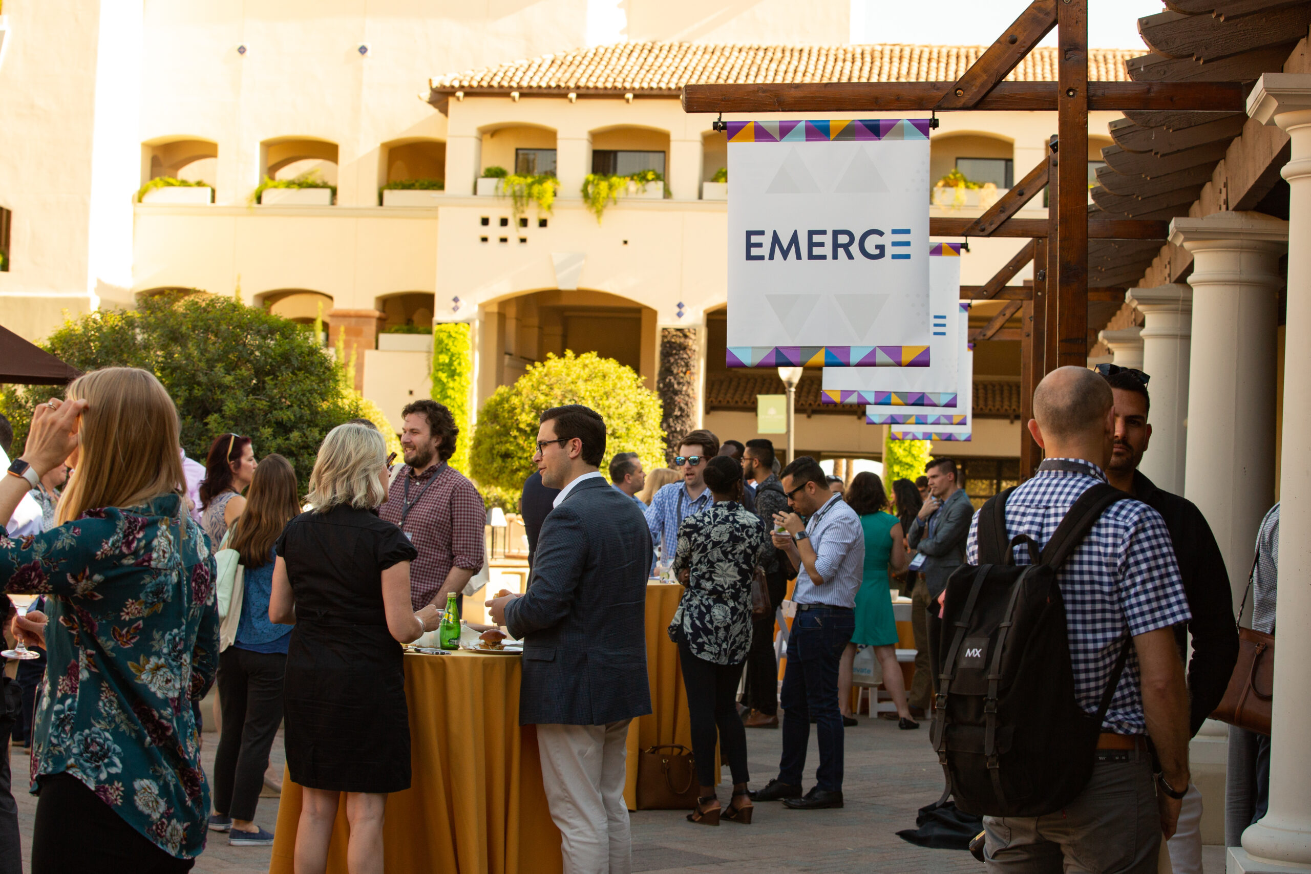 attendees at an outdoor EMERGE reception in Phoenix